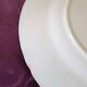 Set of 5 flat plates, signed Longwy.
