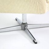 Cream corduroy swivel shell armchairs
