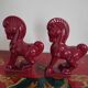 Pair of red porcelain horse bookends