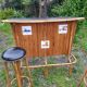 Vintage rattan bar with 1960s earthenware tile decor with 2 stools