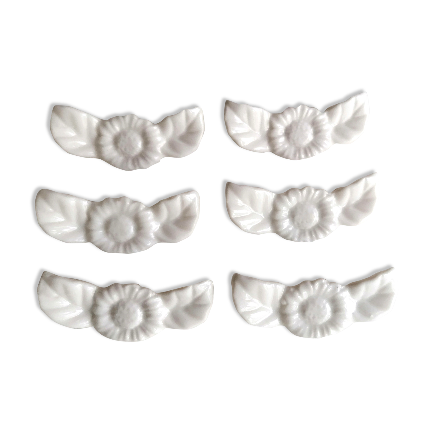 6 porte couteaux en porcelaine blanche