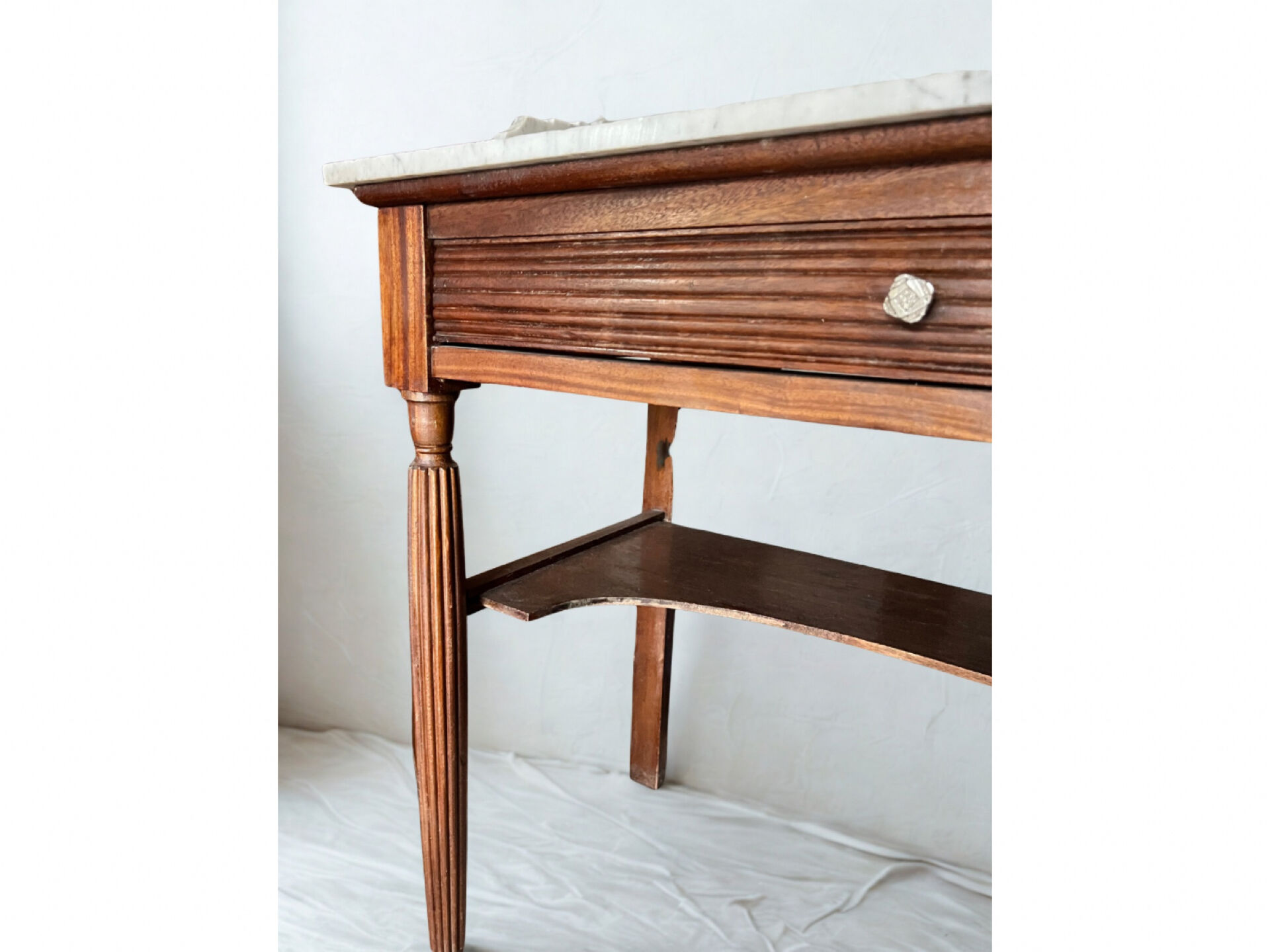 Antique wooden and veined white marble dresser, Louis XVI style.