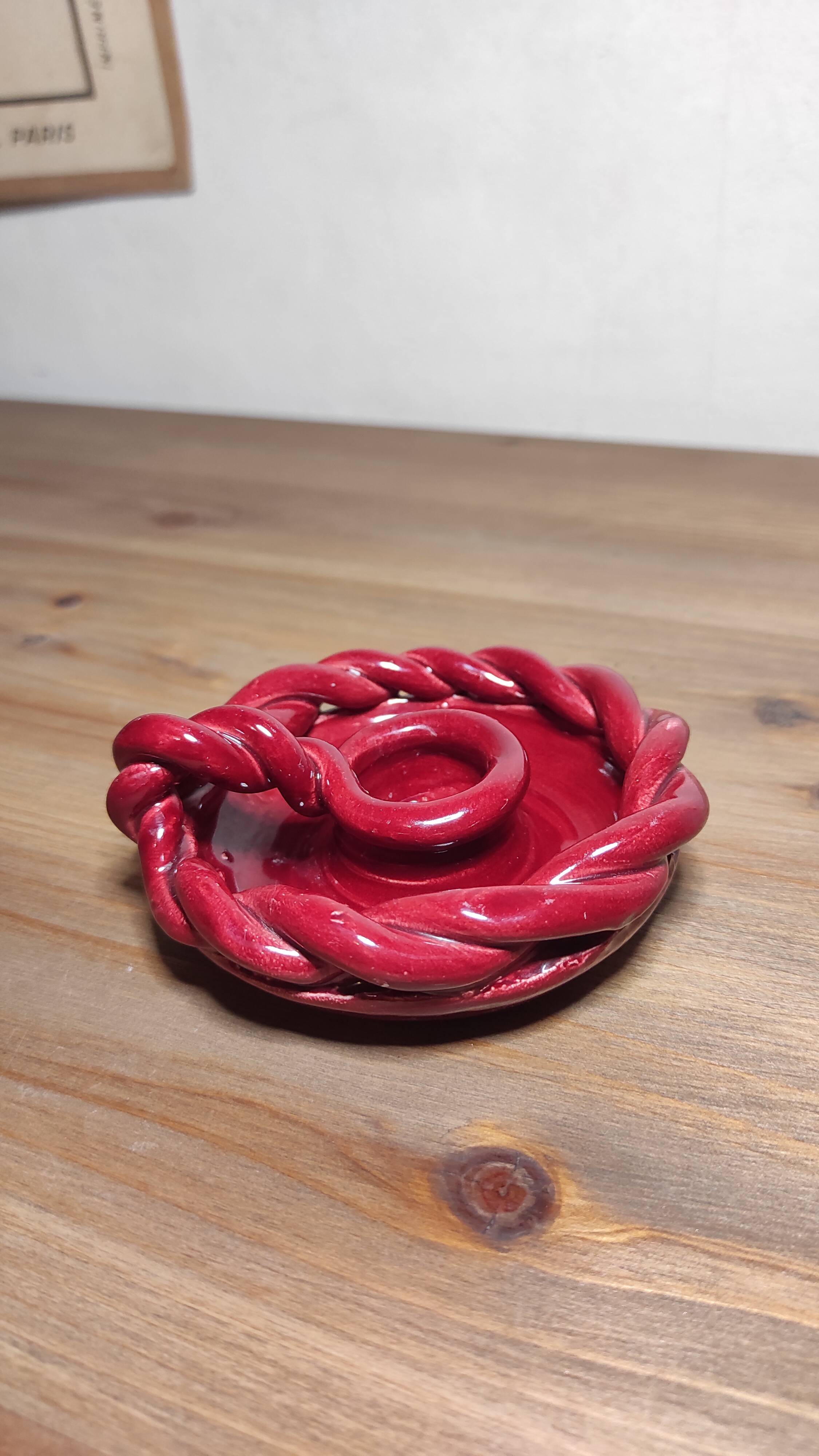 Twisted red earthenware candle holder