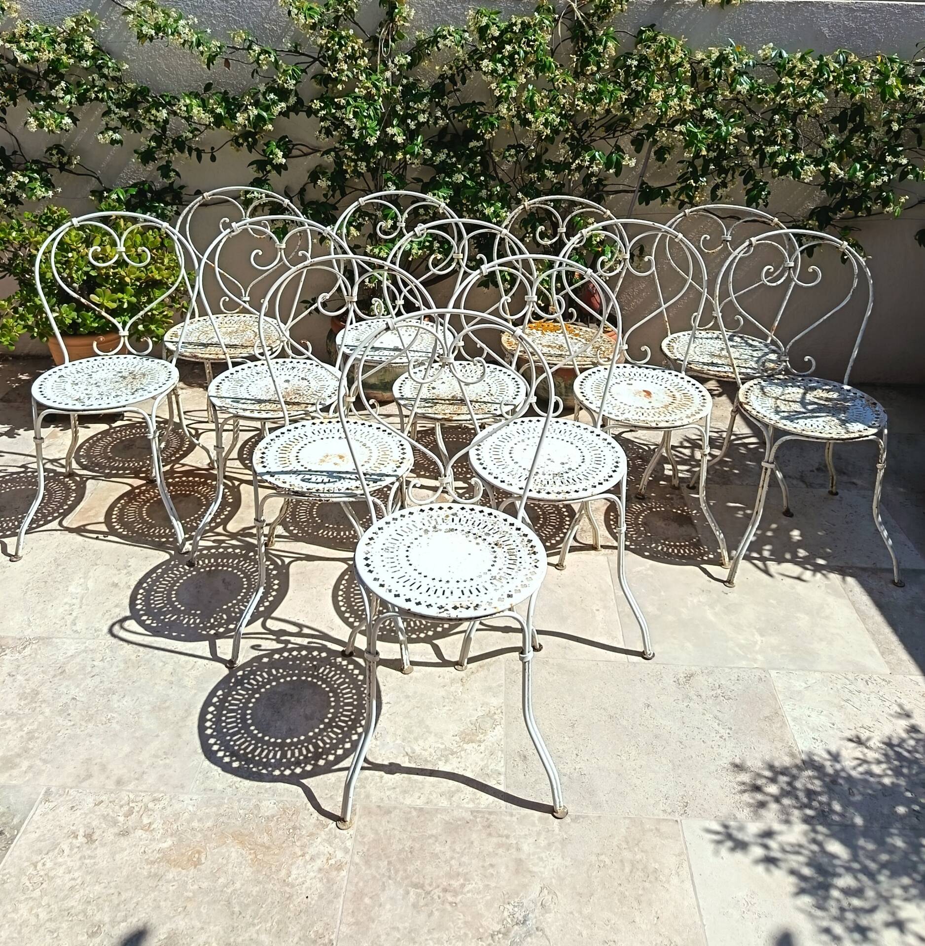 12 chaises Fermob 1900 et table Montmartre