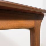Extendable teak dining table in Mid-Century style from McIntosh, UK.