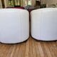 A pair of genuine leather club armchairs.