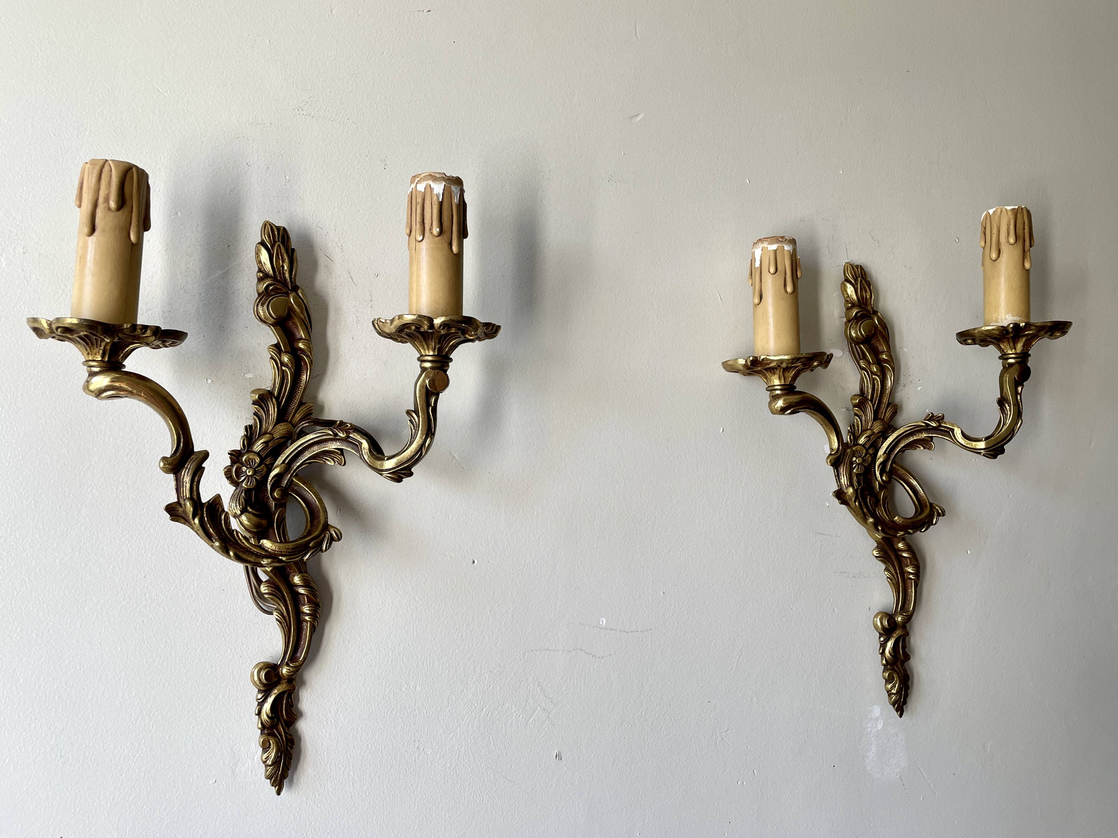 Pair of rocaille bronze wall sconces