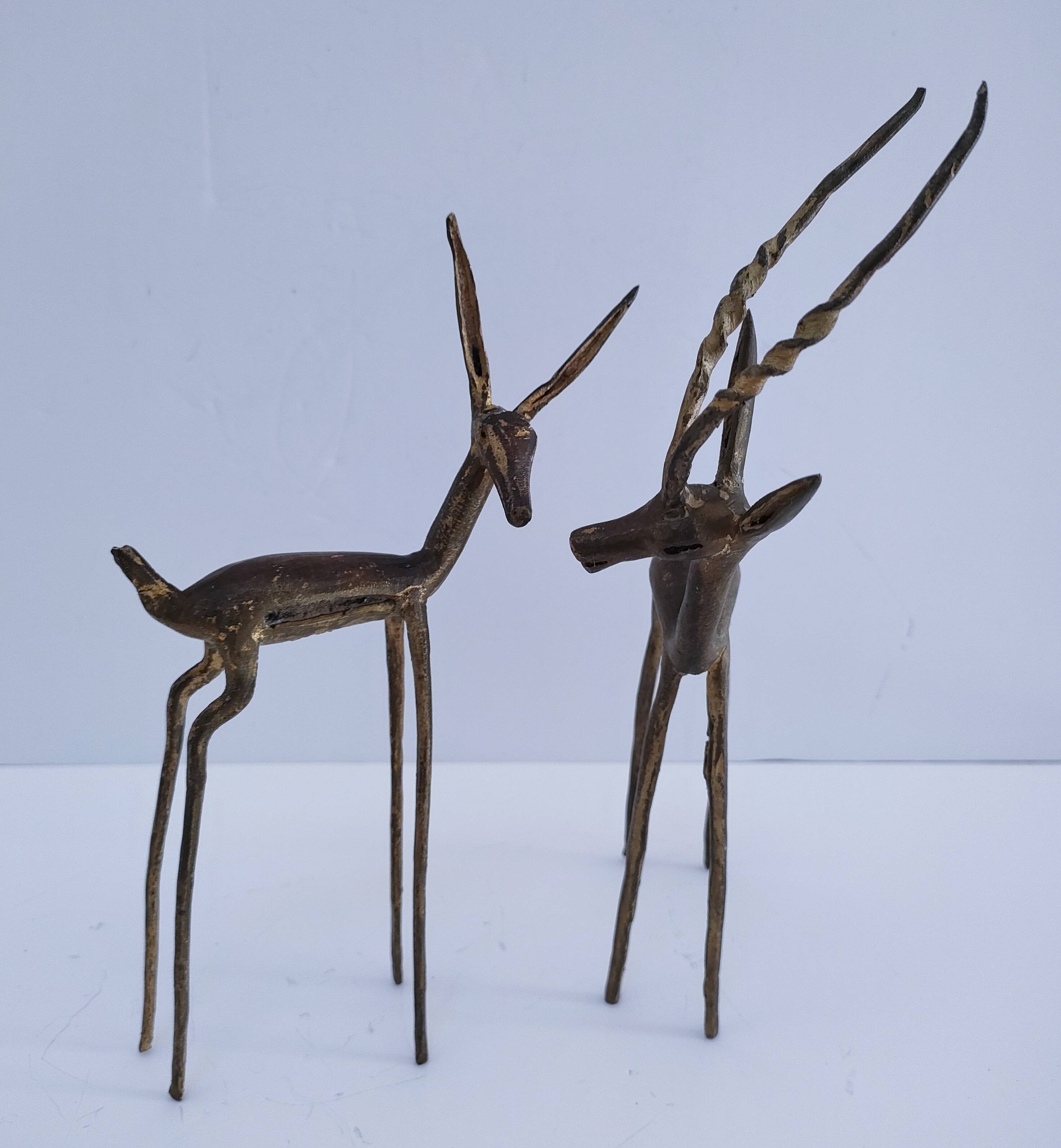 four vintage brass gazelle antelope sculptures