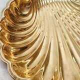 Brass tray in the shape of a shell. Spain, 1970s.