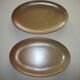 Set of oval stoneware dishes