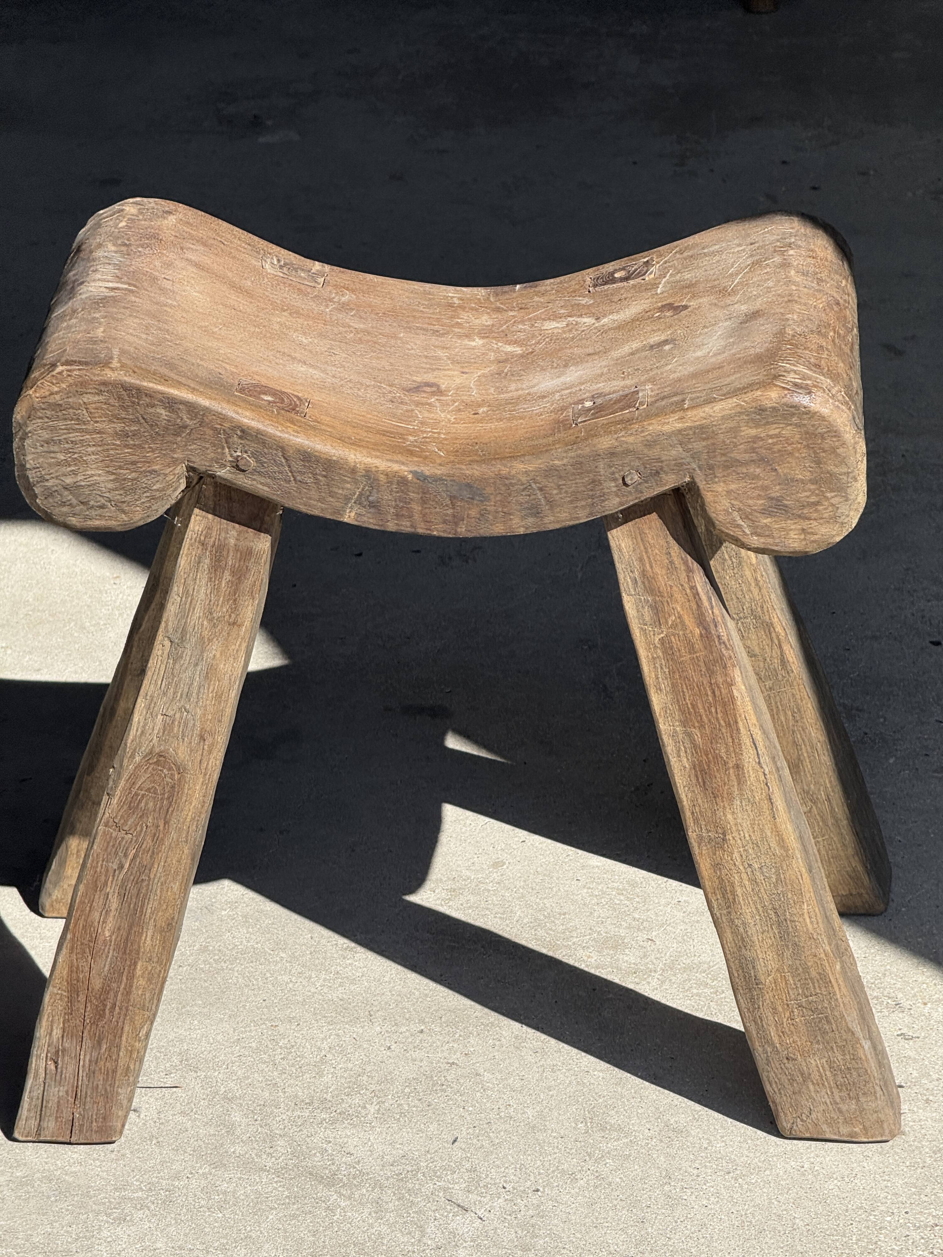 Four-legged stool in antique teak from Indonesia H 50 L 52