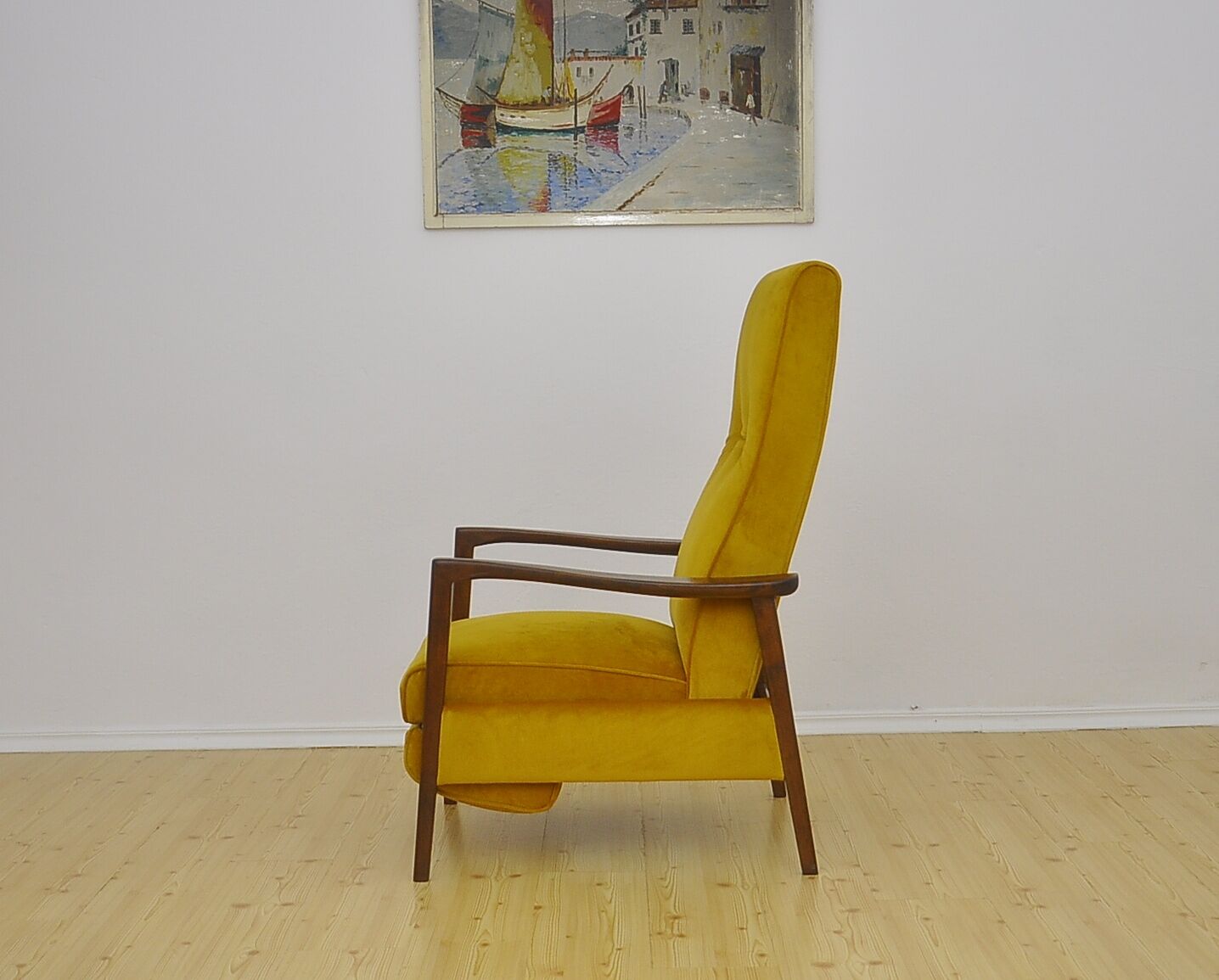 Mid-century armchair with folding footrest, 1960s