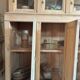 Old wooden grocery store cabinet, display cases and drawers