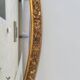 Miroir ovale en bois doré, style Louis XVI