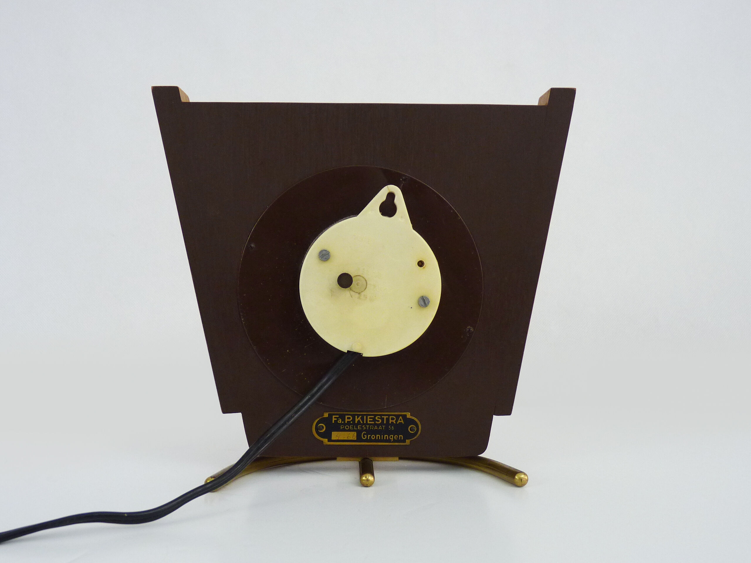 Table clock, art deco clock in Wuba Amsterdam in wood and brass. Year 50