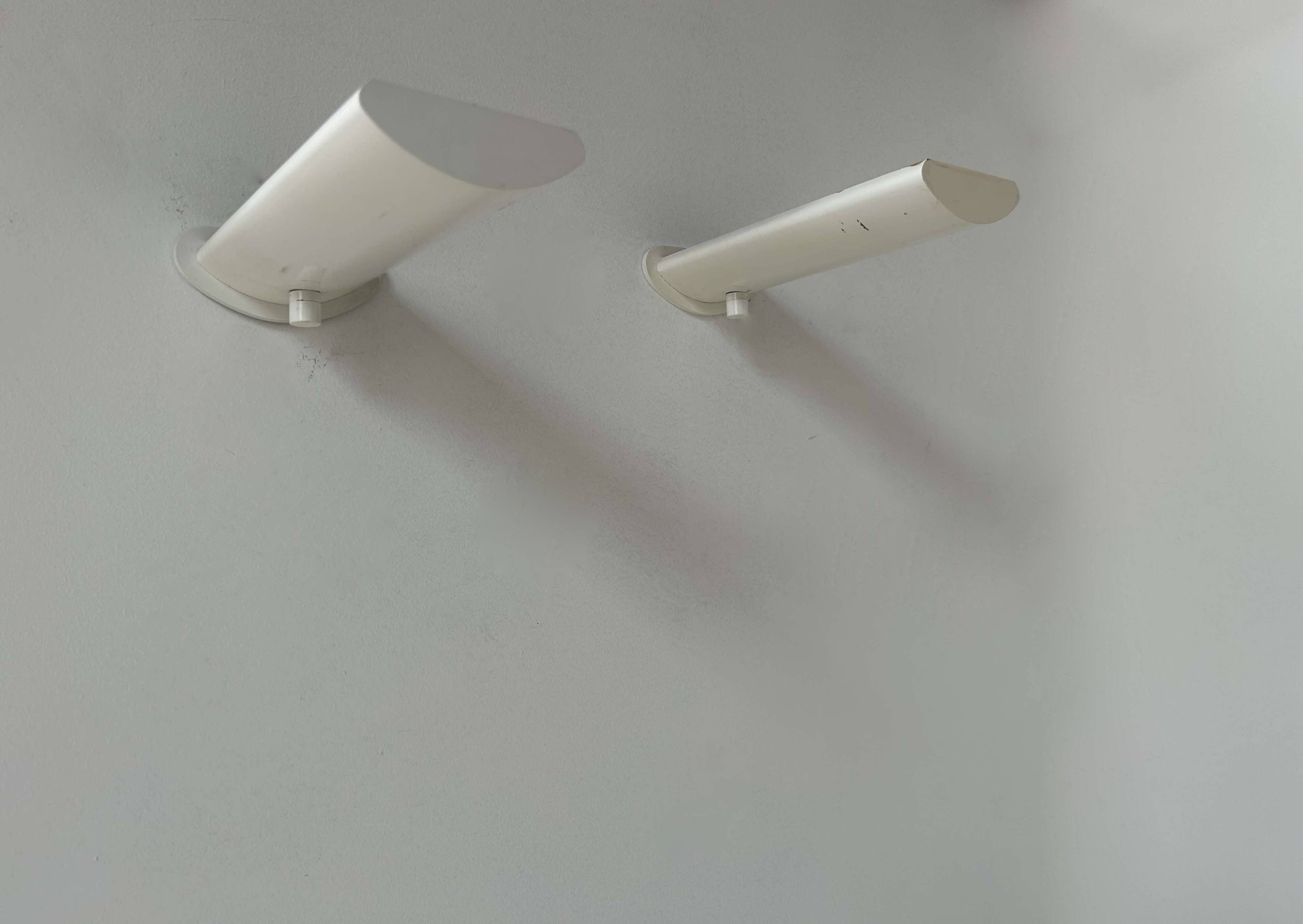 Pair of vintage wall lights with variable intensity, white lacquered metal, France 1970
