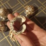 6 carved shell towel rings