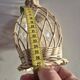 vintage glass vase surrounded by woven rattan