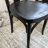Set of 7 black bistro chairs