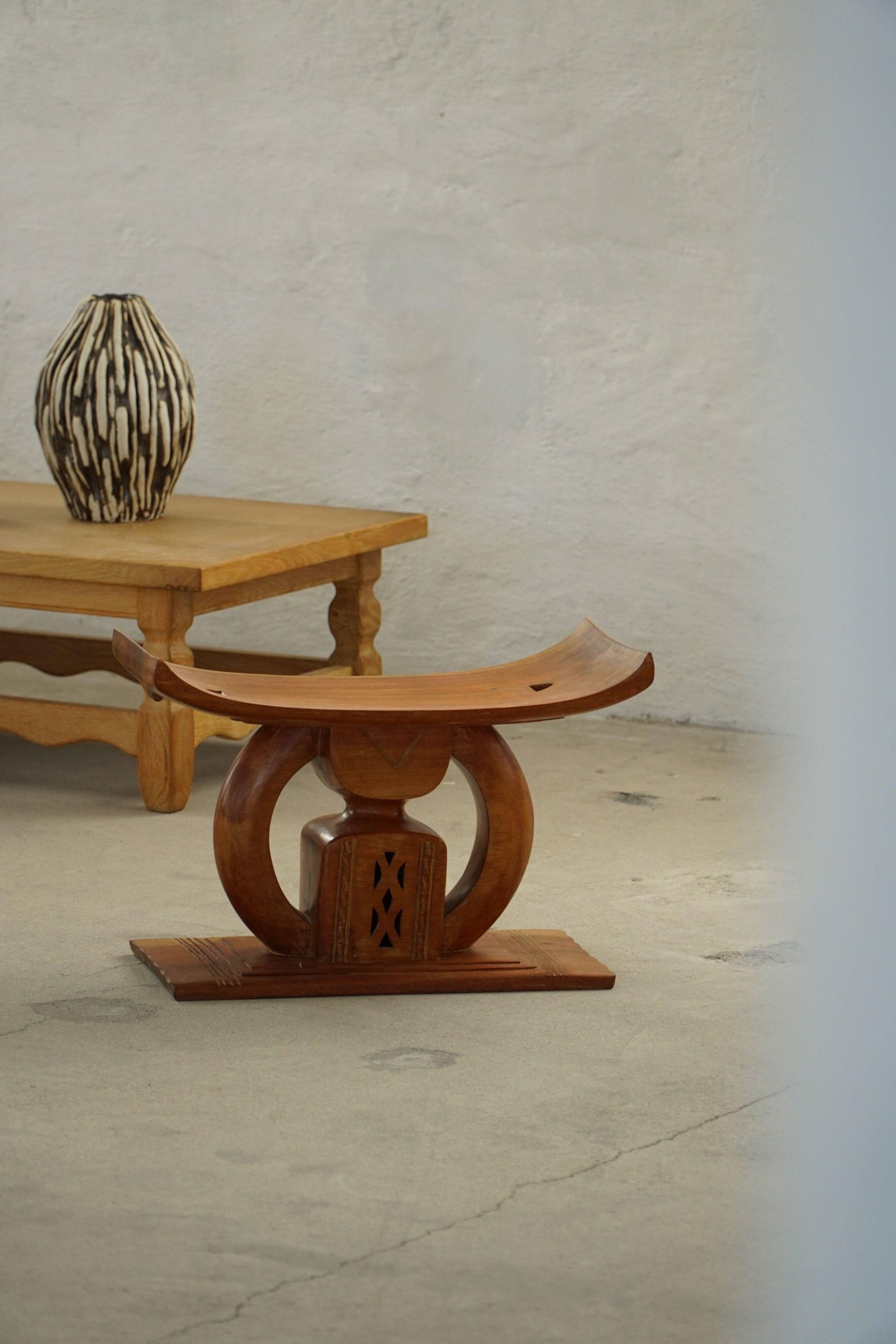 Ashanti stool from West Africa, carved from hardwood, 20th century.
