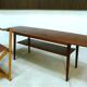 Curved Danish teak coffee table with additional shelf compartment, 1960s