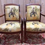 Pair of 19th-century armchairs with a scrolled back
