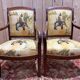 Pair of 19th-century armchairs with a scrolled back