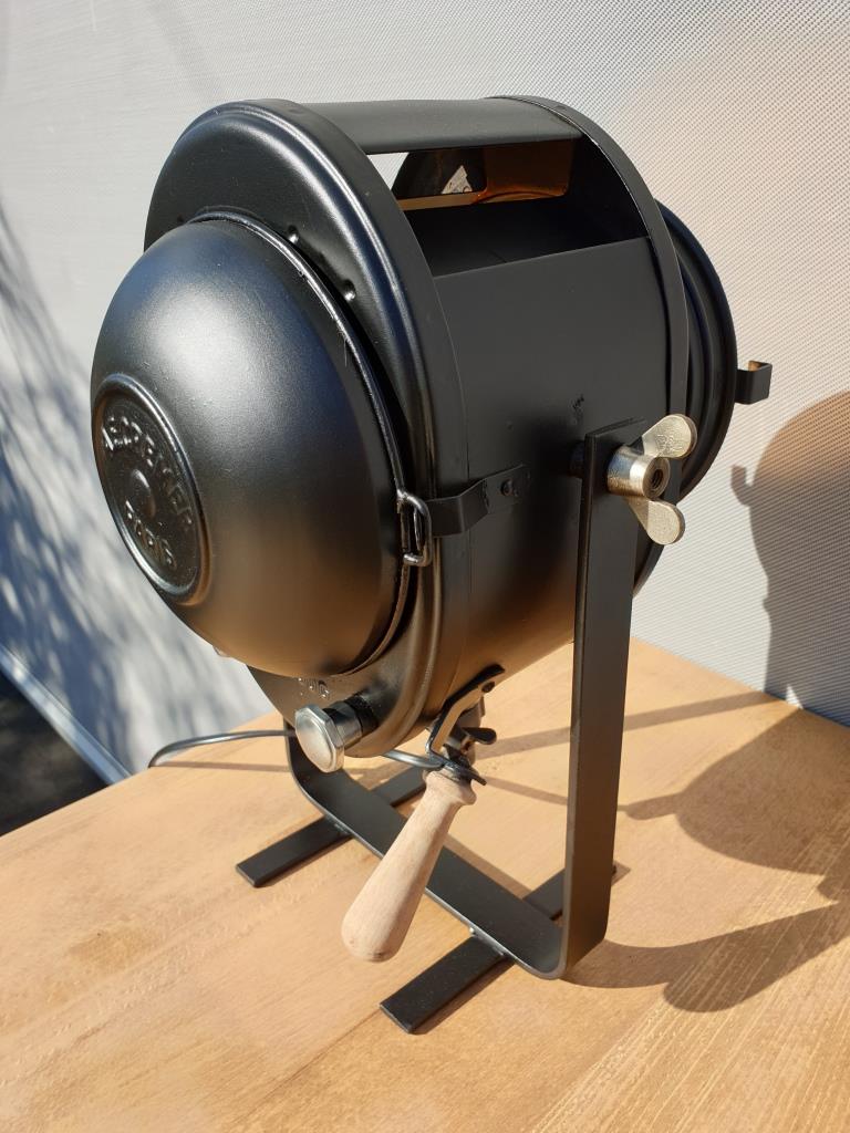 Black Cremer projector with wooden handle and pursuit