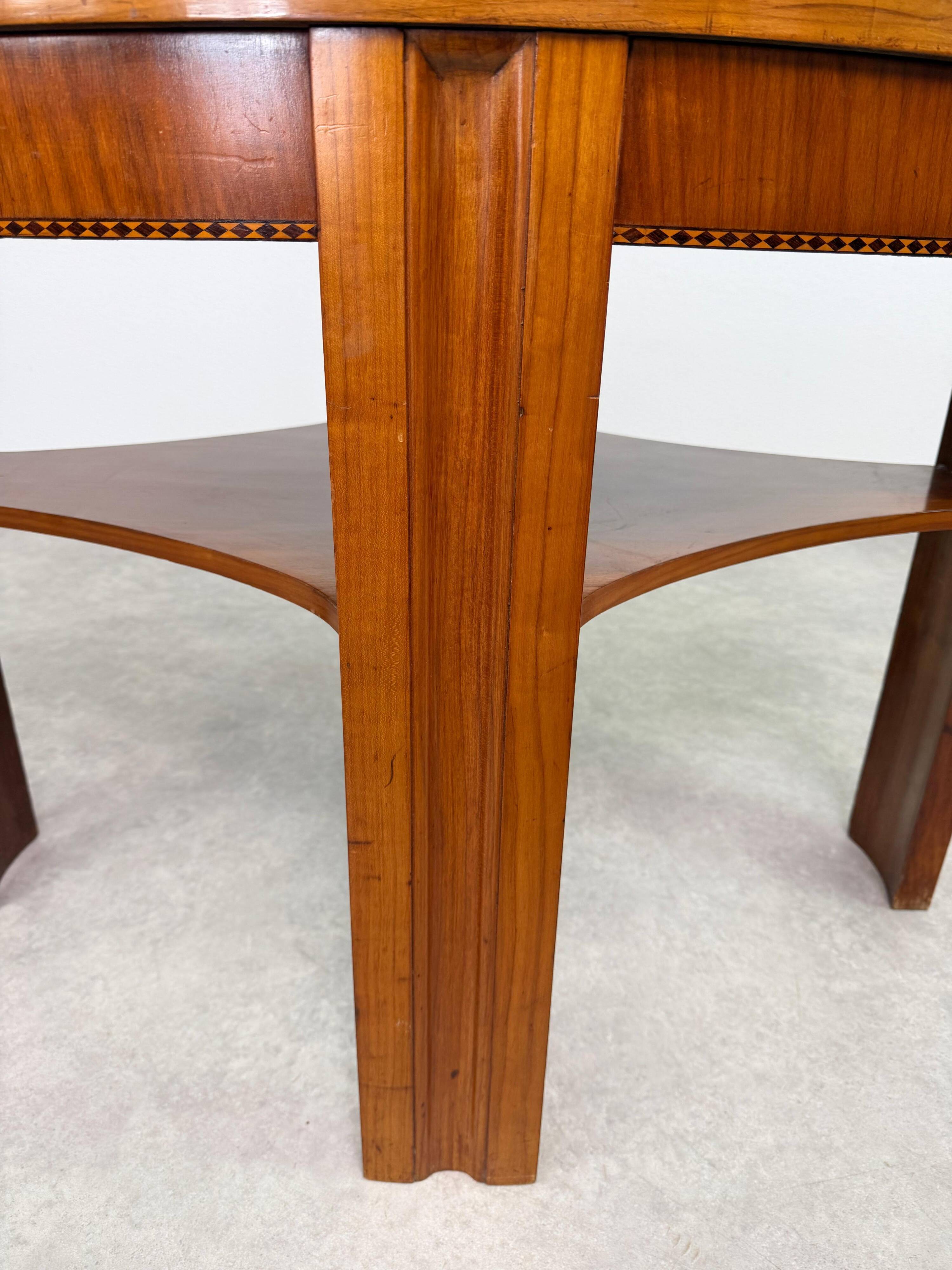 Oval side table in the style of Kolo Moser