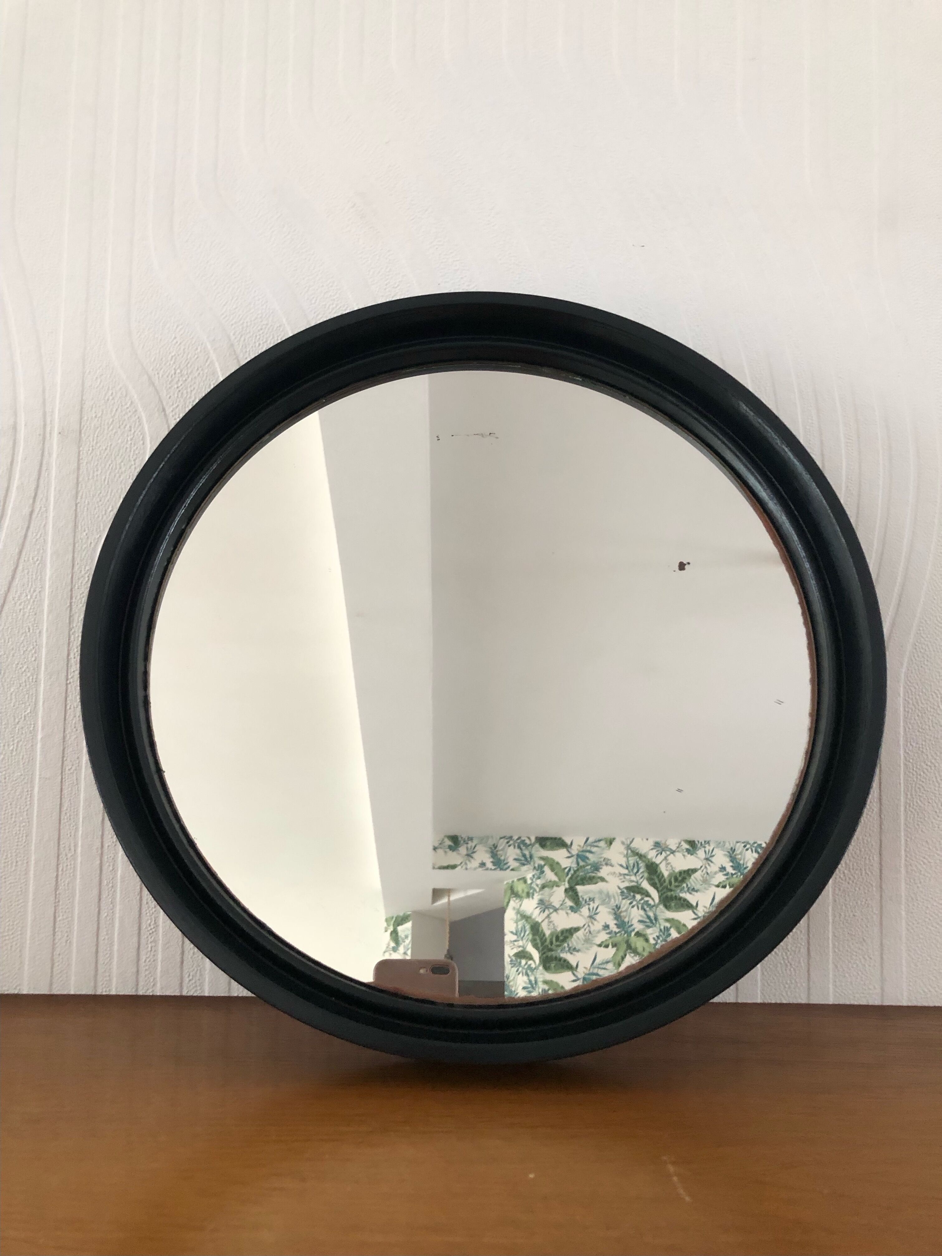 Vintage round mirror in black gilac plastic