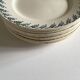 Set of 8 flat plates in iron earthenware from Choisy's 50s