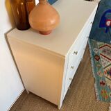 Restored wooden art deco chest of drawers with gilded handles