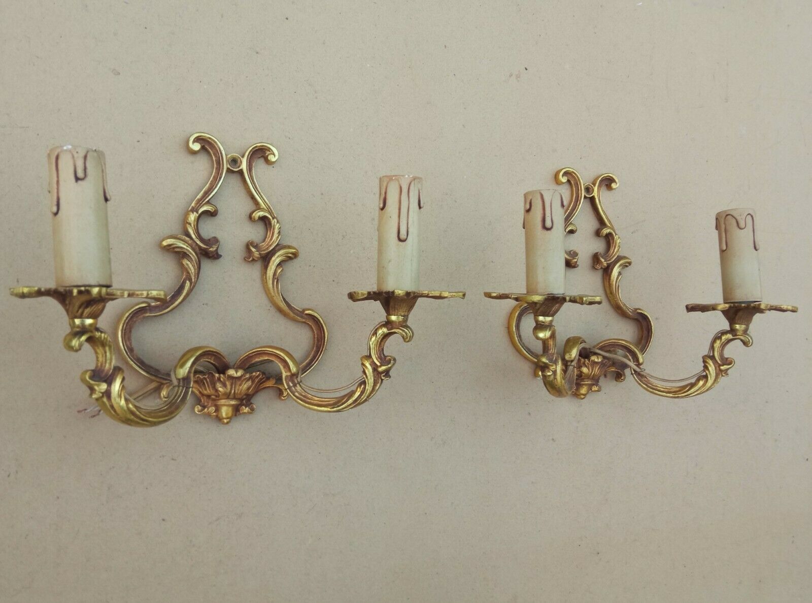 Pair of Louis XV style bronze cage wall lamps