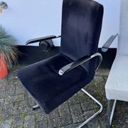 Paire de fauteuils en acier tubulaire