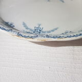 Hollow flat of the earthenware factory of St Amand Regency model, iron earth