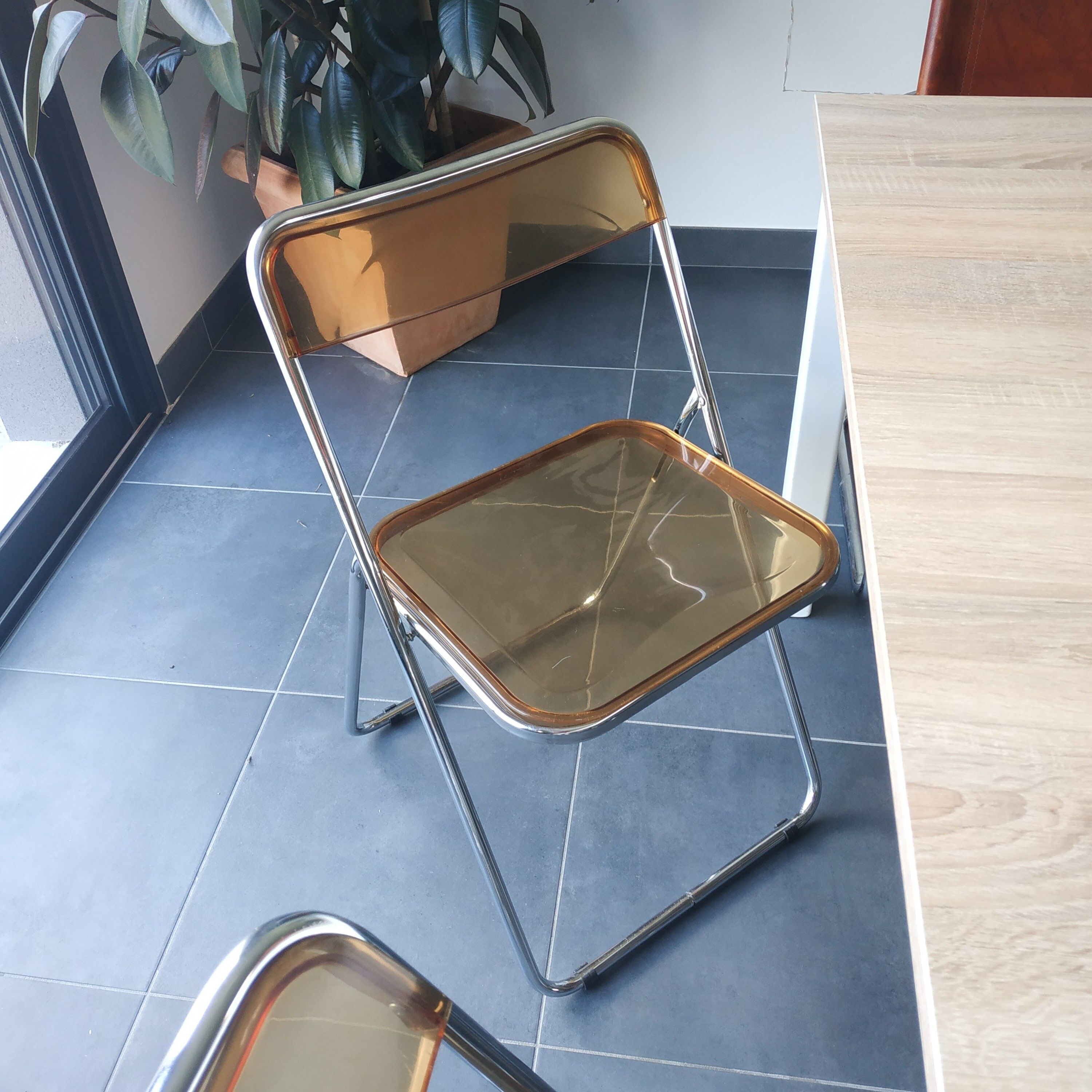 Seventies stainless steel and caramel chairs