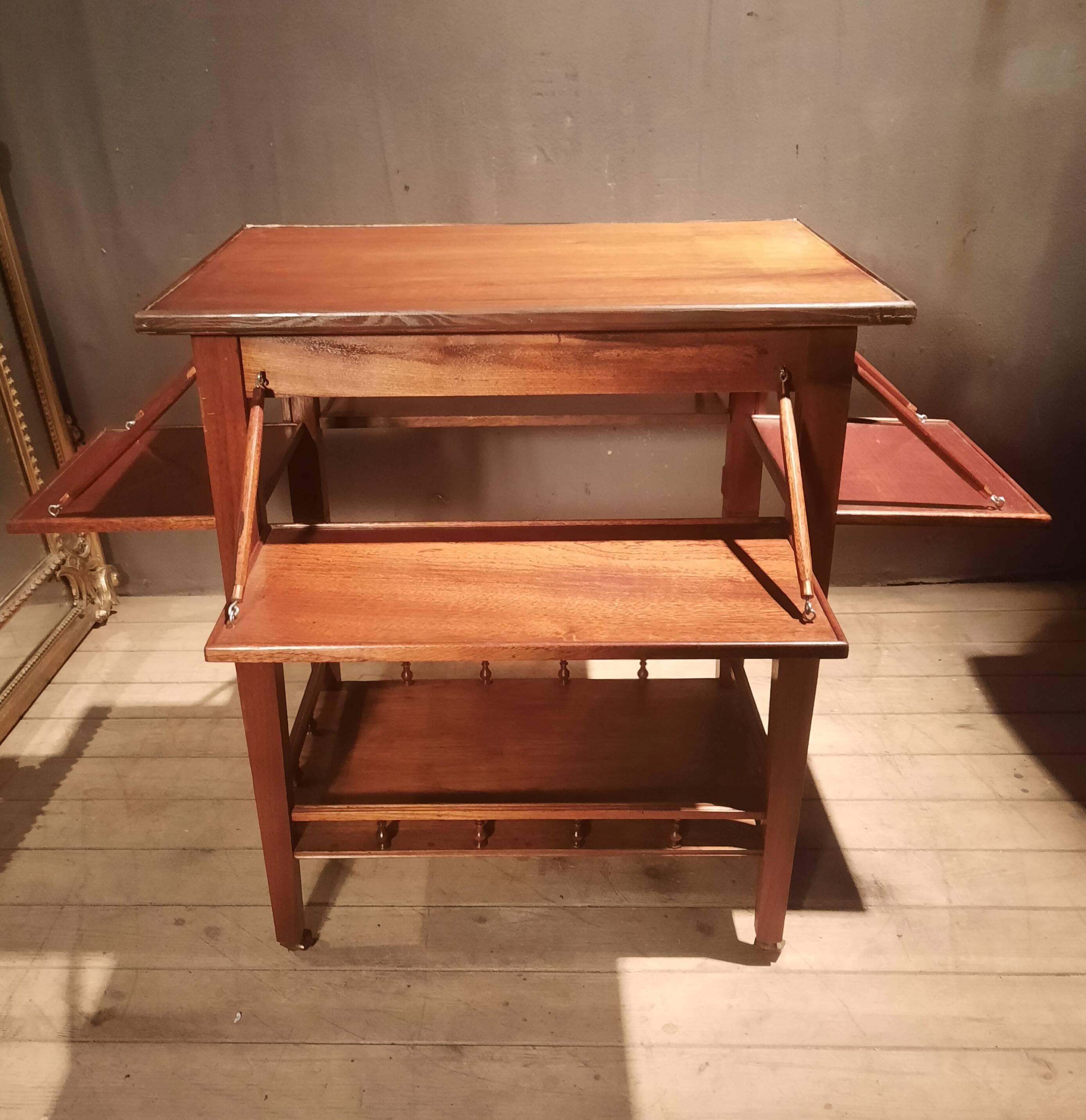 Sideboard with four drop-leaves