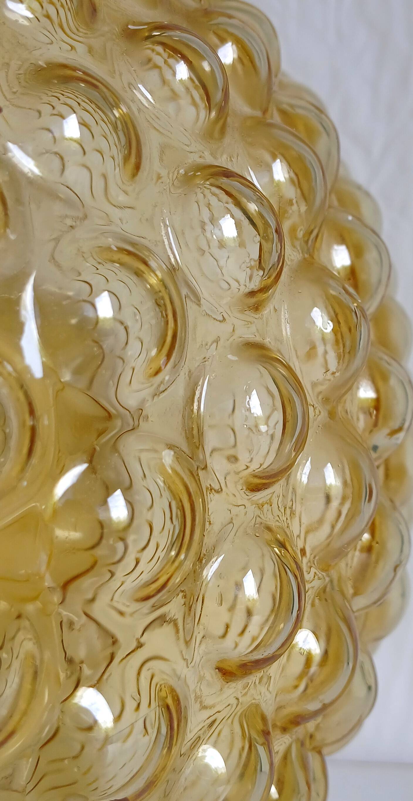"Bubble" suspension in the style of H. Tynell in amber moulded glass, circa 1970.