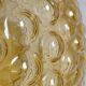 "Bubble" suspension in the style of H. Tynell in amber moulded glass, circa 1970.