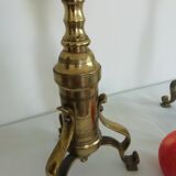 Pair of bronze and brass torch candlesticks