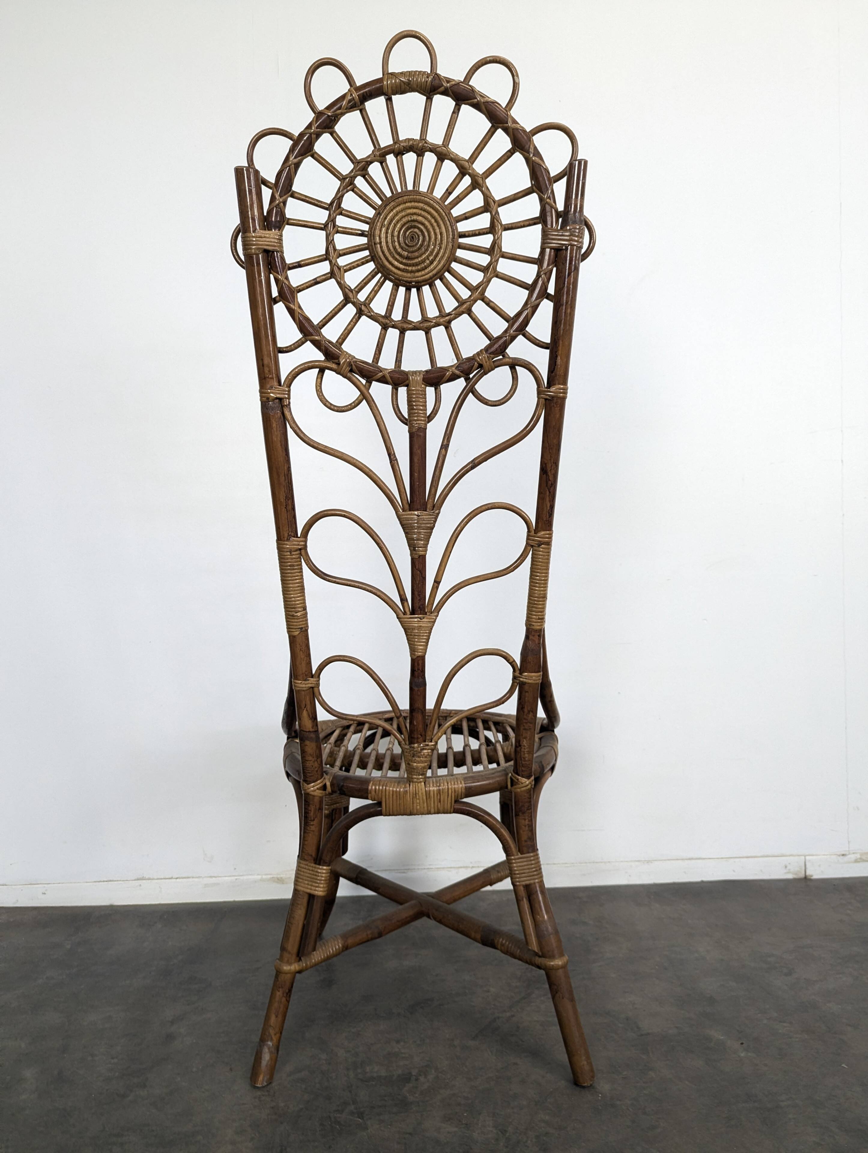 Set of 4 bamboo and rattan chairs with sunflower decoration.