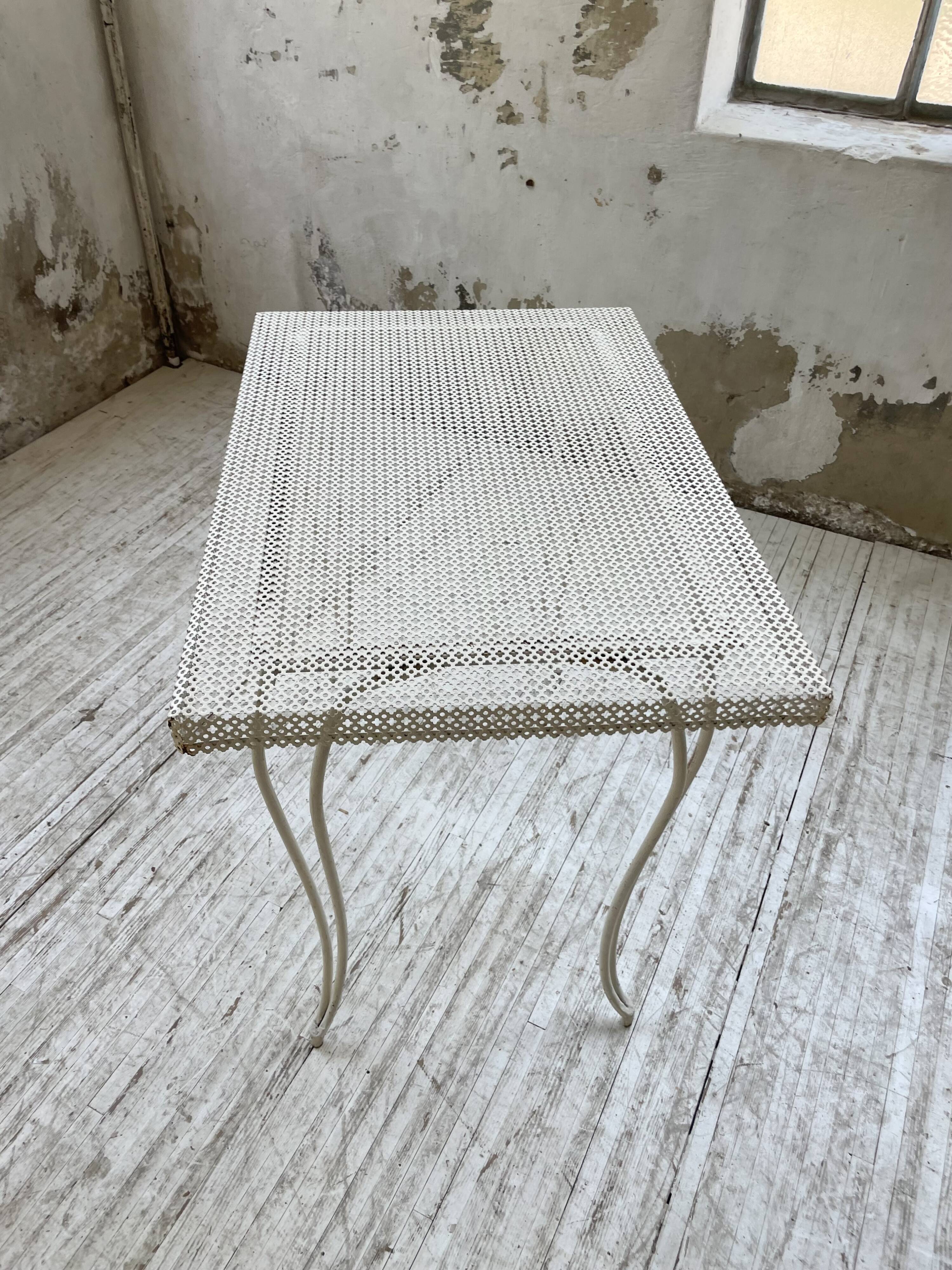 Perforated garden dining table