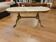 Coffee table in gilded bronze and marble
