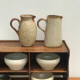 Pair of sandstone pitchers