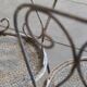 Two iron garden chairs 1950