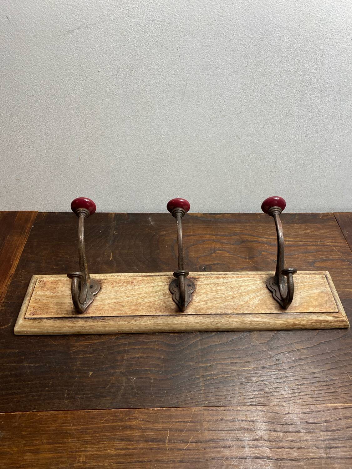 Wall hook with three hooks in wood, wrought iron, porcelain balls