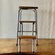 Vintage step stool in brown formica and chrome steel