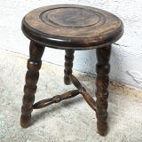 Tripod wooden stool turned