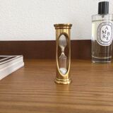Old vintage golden hourglass
