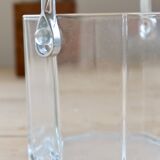 Vintage glass ice bucket with chrome handle.